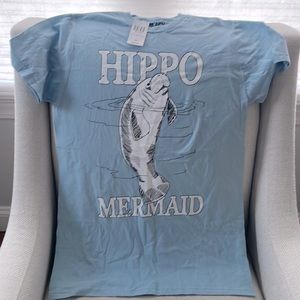 100% cotton T shirt.  Size medium. Brand new w tags.